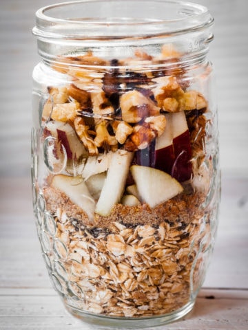 jar with overnight oat ingredients stacked