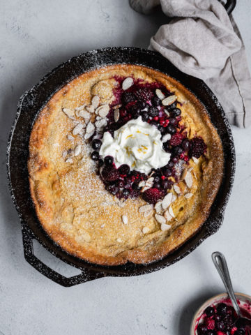 finished dutch baby pancake with berries