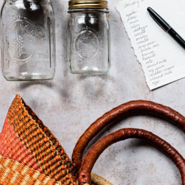 jars with grocery basket and grocery list