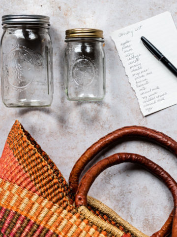 jars with grocery basket and grocery list