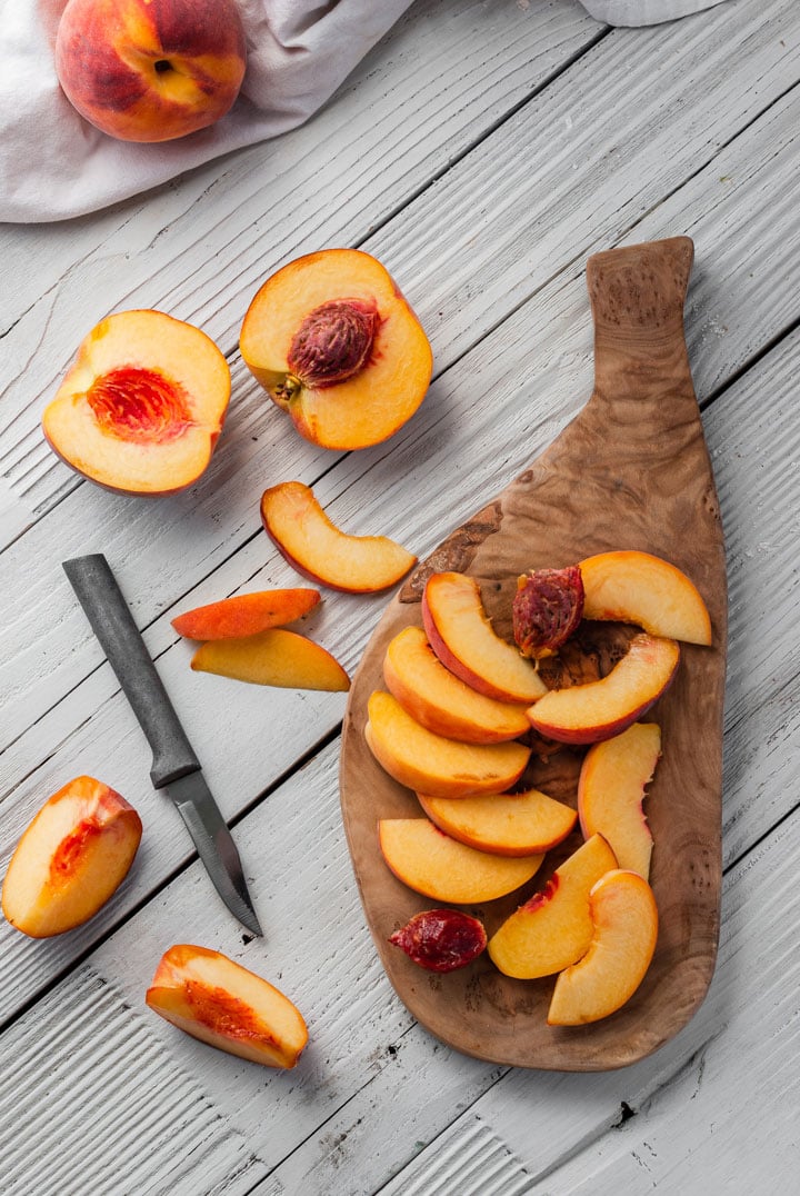 peaches on cutting board