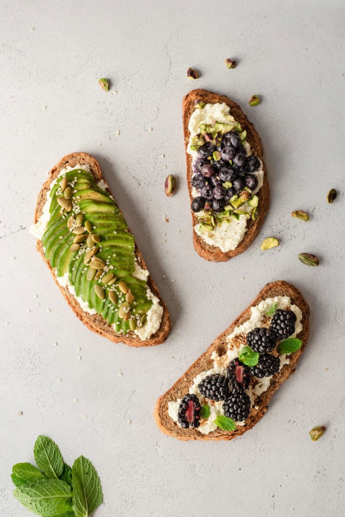 ricotta toast with blueberries, blackberries and avocado