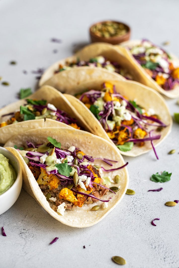 Roasted Cauliflower Tacos with Avocado Crema | The Crooked Carrot
