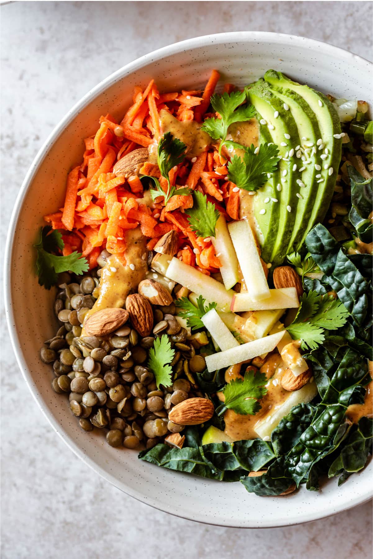 Nourishing Kale and Lentil Bowl with Pickled Carrots and Thai Almond Sauce | The Crooked Carrot