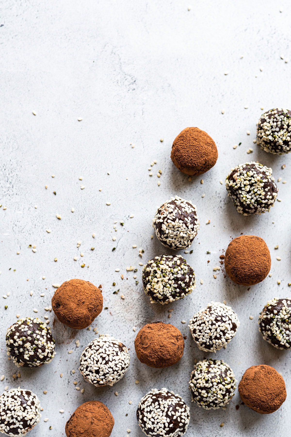 bliss balls coated in cocoa powder and seeds