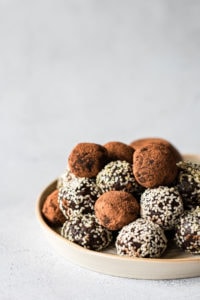 chocolate tahini bliss balls on plate