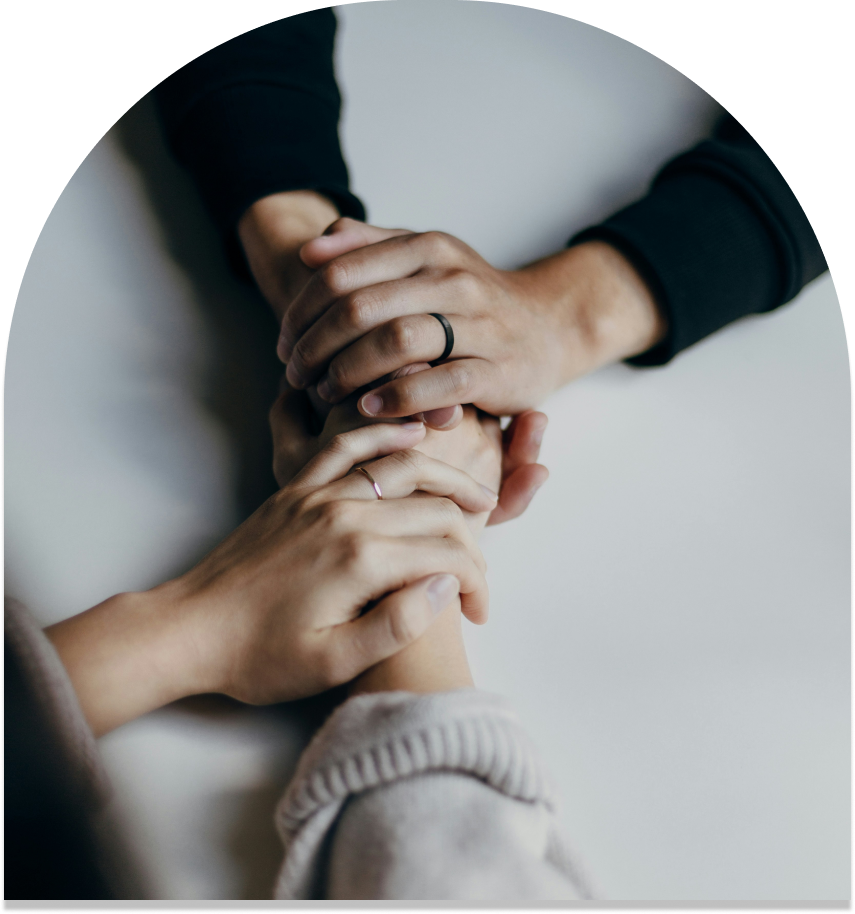 Two pairs of hands holding each other. Nutrition counseling